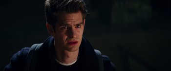 Movie still from “The Amazing Spider-Man 2” (2014), directed by Marc Webb – A person wearing a black jacket; Close Up shot, Over the shoulder angle