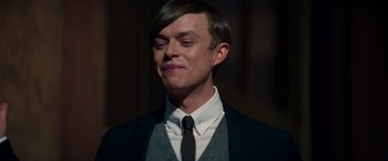 Movie still from “The Amazing Spider-Man 2” (2014), directed by Marc Webb – A man with a black jacket and a white shirt and a black tie; Close Up shot, Over the shoulder angle