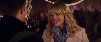 Movie still from “The Amazing Spider-Man 2” (2014), directed by Marc Webb – A person wearing a jacket and a scarf; Close Up shot, Over the shoulder angle