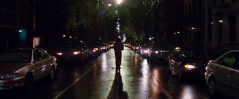 Movie still from “The Amazing Spider-Man 2” (2014), directed by Marc Webb – A man is standing in the middle of a street; Extreme Wide shot, Low angle