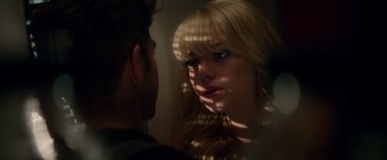 Movie still from “The Amazing Spider-Man 2” (2014), directed by Marc Webb – A man and a woman looking at one another in a mirror; Close Up shot, Over the shoulder angle