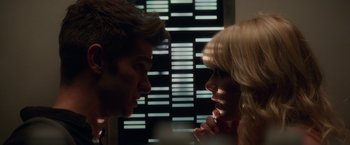 Movie still from “The Amazing Spider-Man 2” (2014), directed by Marc Webb – A man and a woman looking at one another; Close Up shot, Over the shoulder angle