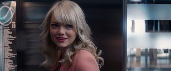 Movie still from “The Amazing Spider-Man 2” (2014), directed by Marc Webb – A person with long hair; Close Up shot, Over the shoulder angle