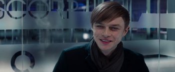 Movie still from “The Amazing Spider-Man 2” (2014), directed by Marc Webb – A young man with long brown hair wearing a black jacket; Close Up shot, Over the shoulder angle