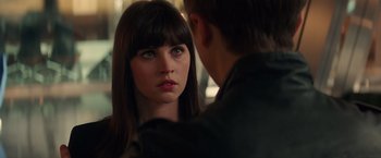 Movie still from “The Amazing Spider-Man 2” (2014), directed by Marc Webb – A woman looking at a man in a leather jacket; Close Up shot, Over the shoulder angle