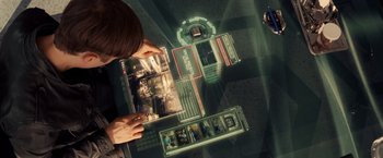 Movie still from “The Amazing Spider-Man 2” (2014), directed by Marc Webb – A person looking at a computer screen; Extreme Close Up shot, Overhead angle