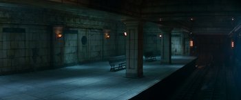 Movie still from “The Amazing Spider-Man 2” (2014), directed by Marc Webb – A bench sitting in the middle of a train platform; Extreme Wide shot, High angle