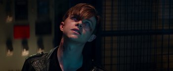 Movie still from “The Amazing Spider-Man 2” (2014), directed by Marc Webb – A young man looking up into the air; Close Up shot, Over the shoulder angle