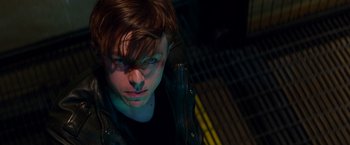 Movie still from “The Amazing Spider-Man 2” (2014), directed by Marc Webb – A young man with dark hair wearing a leather jacket; Close Up shot, Low angle