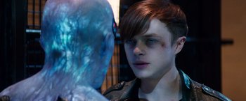 Movie still from “The Amazing Spider-Man 2” (2014), directed by Marc Webb – A young man stares at another man in a leather jacket; Close Up shot, Over the shoulder angle