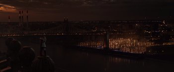 Movie still from “The Amazing Spider-Man 2” (2014), directed by Marc Webb – A view of a city at night from a bridge; Extreme Wide shot, High angle