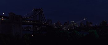 Movie still from “The Amazing Spider-Man 2” (2014), directed by Marc Webb – A view of a bridge and a city skyline at night time; Extreme Wide shot, High angle