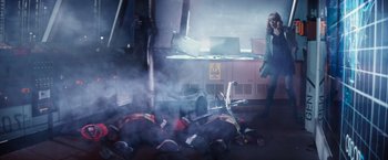 Movie still from “The Amazing Spider-Man 2” (2014), directed by Marc Webb – A group of people laying on the ground in a room; Wide shot, High angle