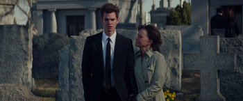 Movie still from “The Amazing Spider-Man 2” (2014), directed by Marc Webb – A man and a woman standing next to each other; Medium shot, Over the shoulder angle