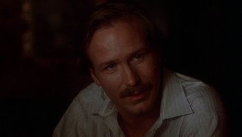 Movie still from “Body Heat” (1981), directed by Lawrence Kasdan – A person with a mustache; Close Up shot, Over the shoulder angle