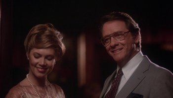 Movie still from “Body Heat” (1981), directed by Lawrence Kasdan – A man and a woman standing next to each other; Close Up shot, Low angle