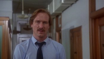 Movie still from “Body Heat” (1981), directed by Lawrence Kasdan – A person wearing a shirt and a tie; Close Up shot, Low angle