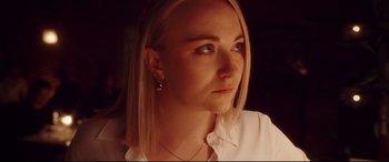 A person wearing a white shirt