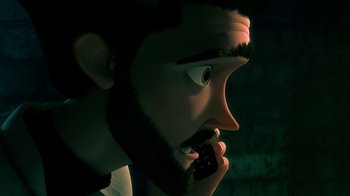 Movie still from “Bolt” (2008), directed by Chris Williams – An animated character is talking on a cell phone; Close Up shot, Overhead angle