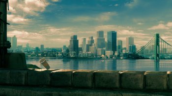 Movie still from “Bolt” (2008), directed by Chris Williams – A paper cup on the side of the water; Extreme Wide shot, High angle