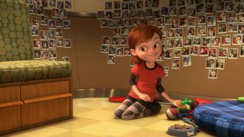 Movie still from “Bolt” (2008), directed by Chris Williams – A girl sitting on the floor playing with toys; Wide shot, Over the shoulder angle
