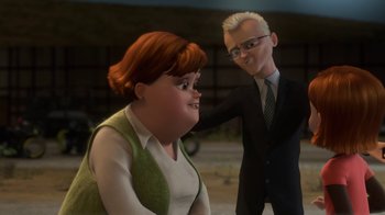 Movie still from “Bolt” (2008), directed by Chris Williams – An animated woman and a man in business attire; Medium shot, Over the shoulder angle