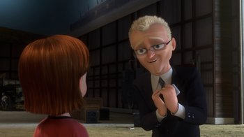Movie still from “Bolt” (2008), directed by Chris Williams – A man in a business suit talking to a girl; Medium shot, Over the shoulder angle