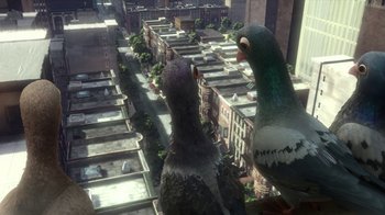 Movie still from “Bolt” (2008), directed by Chris Williams – Two pigeons are standing on a ledge above a city; Wide shot, Low angle