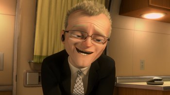 Movie still from “Bolt” (2008), directed by Chris Williams – An animated picture of a man in a suit and tie; Close Up shot, High angle