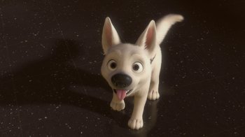 Movie still from “Bolt” (2008), directed by Chris Williams – A toy dog with its tongue hanging out; Close Up shot, High angle