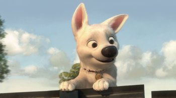 Movie still from “Bolt” (2008), directed by Chris Williams – A white dog is looking over a ledge; Close Up shot, High angle