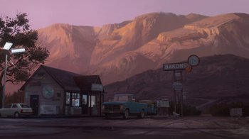 Movie still from “Bolt” (2008), directed by Chris Williams – An old truck parked in front of a gas station with mountains in the background; Extreme Wide shot, High angle