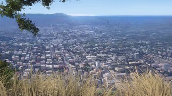 Movie still from “Bolt” (2008), directed by Chris Williams – An aerial view of a large city from a hill; Extreme Wide shot, High angle