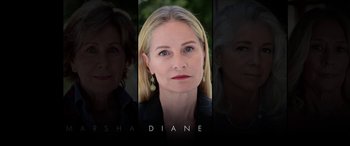 Movie still from “Bombshell” (2019), directed by Jay Roach – A picture of a woman in a black shirt; Close Up shot, Overhead angle