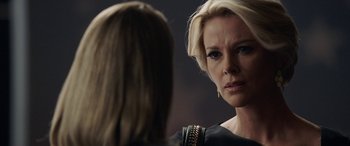 Movie still from “Bombshell” (2019), directed by Jay Roach – Two women are talking to each other in front of a mirror; Close Up shot, Over the shoulder angle