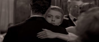 Movie still from “Bonjour Tristesse” (1958), directed by Otto Preminger – A man and a woman embracing each other; Close Up shot, Over the shoulder angle