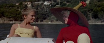 Movie still from “Bonjour Tristesse” (1958), directed by Otto Preminger – Two women sitting next to each other on a boat in the water; Medium shot, Low angle