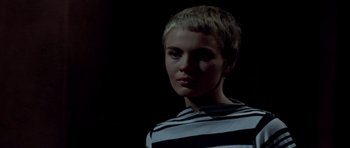 Movie still from “Bonjour Tristesse” (1958), directed by Otto Preminger – A woman with short blonde hair wearing a striped shirt; Close Up shot, Low angle