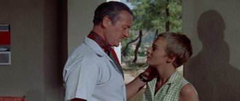 Movie still from “Bonjour Tristesse” (1958), directed by Otto Preminger – A man and a woman standing next to each other; Medium shot, Low angle