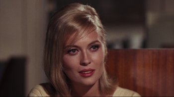 Movie still from “Bonnie and Clyde” (1967), directed by Arthur Penn – A person with blonde hair; Close Up shot, Over the shoulder angle