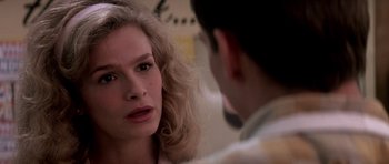 Movie still from “Born on the Fourth of July” (1989), directed by Oliver Stone – A man and a woman looking at one another; Close Up shot, Over the shoulder angle