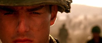 Movie still from “Born on the Fourth of July” (1989), directed by Oliver Stone – A soldier's face in the sunlight; Close Up shot, Low angle