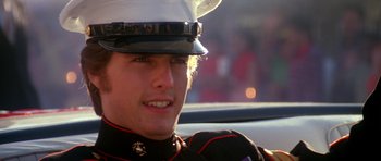 Movie still from “Born on the Fourth of July” (1989), directed by Oliver Stone – A person wearing a uniform; Close Up shot, Low angle