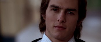 Movie still from “Born on the Fourth of July” (1989), directed by Oliver Stone – A person with long hair; Close Up shot, Over the shoulder angle