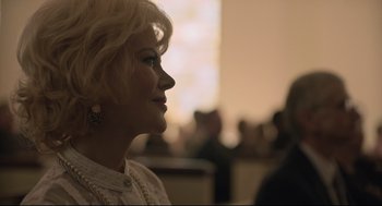 Movie still from “Boy Erased” (2018), directed by Joel Edgerton – A woman with blonde hair looking to her left; Close Up shot, Over the shoulder angle