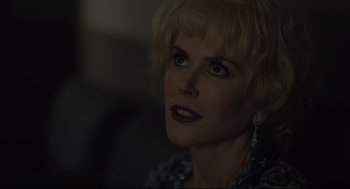 Movie still from “Boy Erased” (2018), directed by Joel Edgerton – A person with short blonde hair; Close Up shot, Over the shoulder angle