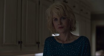 Movie still from “Boy Erased” (2018), directed by Joel Edgerton – A woman with blonde hair wearing a blue shirt; Close Up shot, Low angle