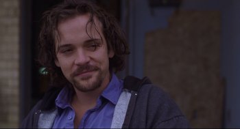 Movie still from “Boys Don't Cry” (1999), directed by Kimberly Peirce – A person with long hair; Close Up shot, Over the shoulder angle