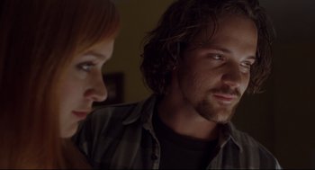 Movie still from “Boys Don't Cry” (1999), directed by Kimberly Peirce – A man and a woman looking at each other; Close Up shot, Low angle