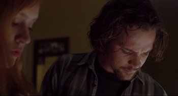 Movie still from “Boys Don't Cry” (1999), directed by Kimberly Peirce – A person with long hair; Close Up shot, Low angle